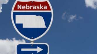 A close-up of a Nebraska highway sign.