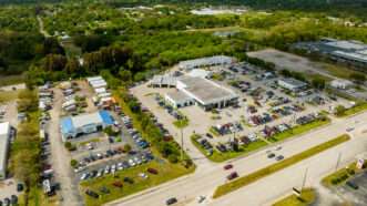 Aerial photo of Florida car dealerships.