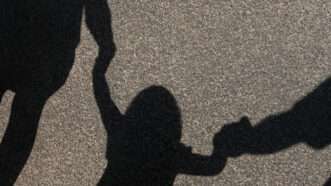 Child in shadow
