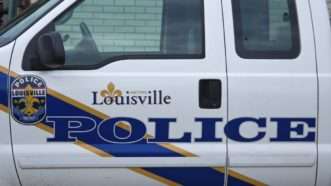 The door to a Louisville Police vehicle
