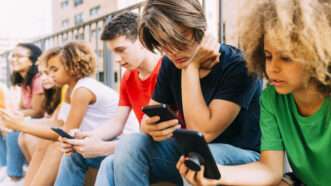 Teens using their phones for social media